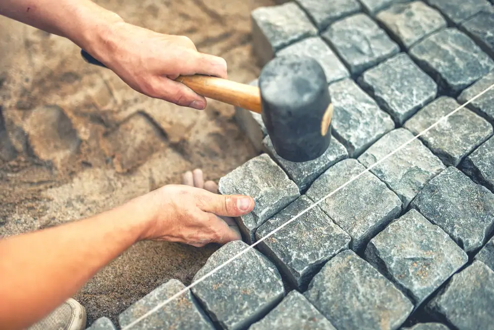 Professional paving stone installation services in Suffolk County, NY by Power House Mason Supply, creating durable and aesthetically pleasing outdoor surfaces